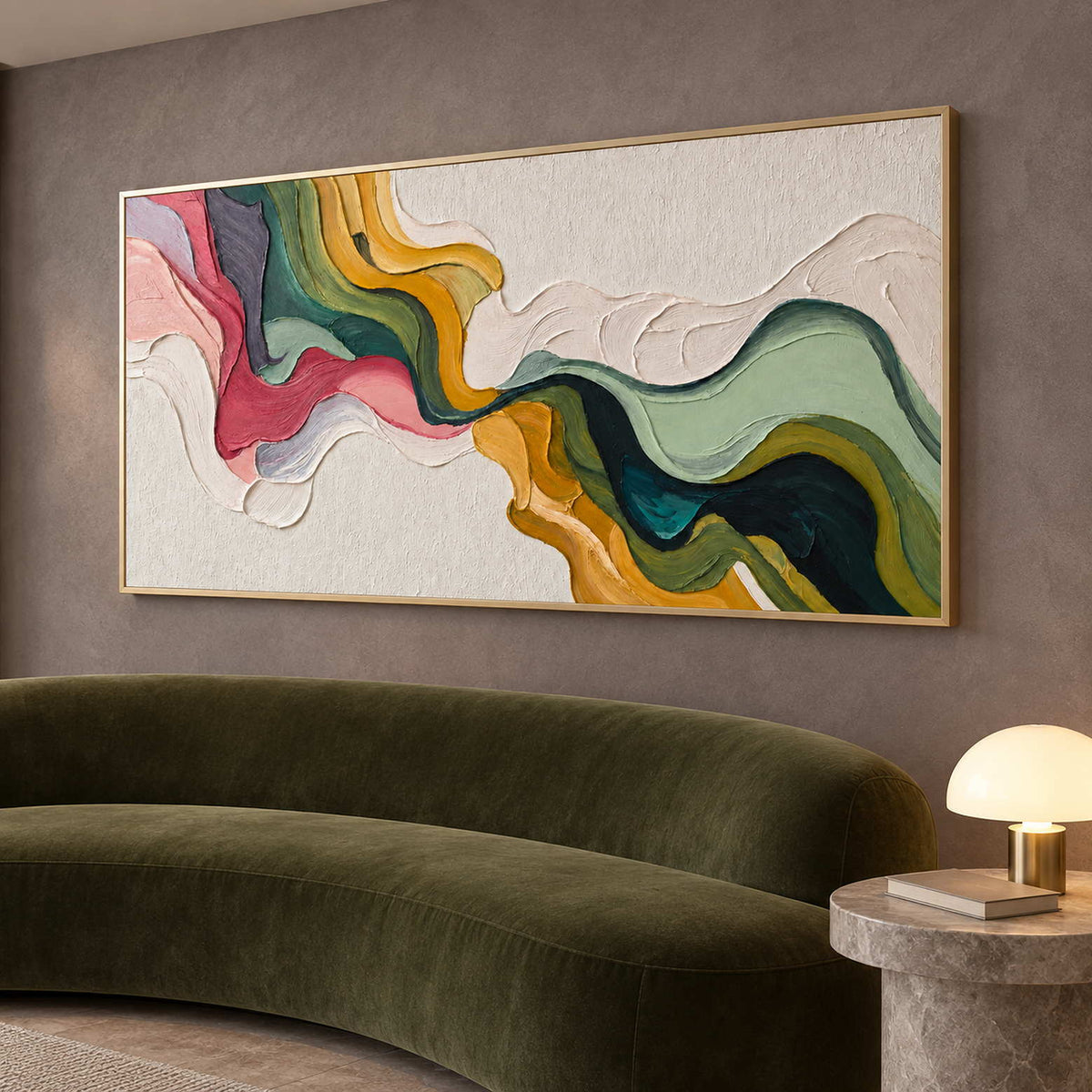 Colorful folded-band painting above a curved olive sofa against a taupe wall.