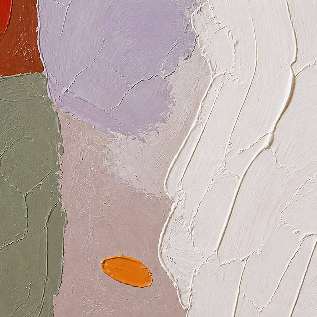 Close-up of ivory relief beside lilac, sage, and orange accents.