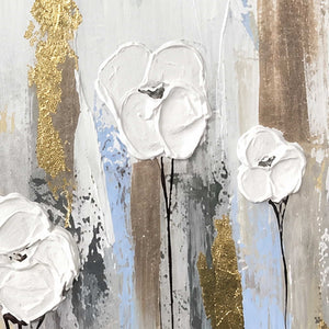 Close view of raised white petals, slender black stems, and gold textured accents.