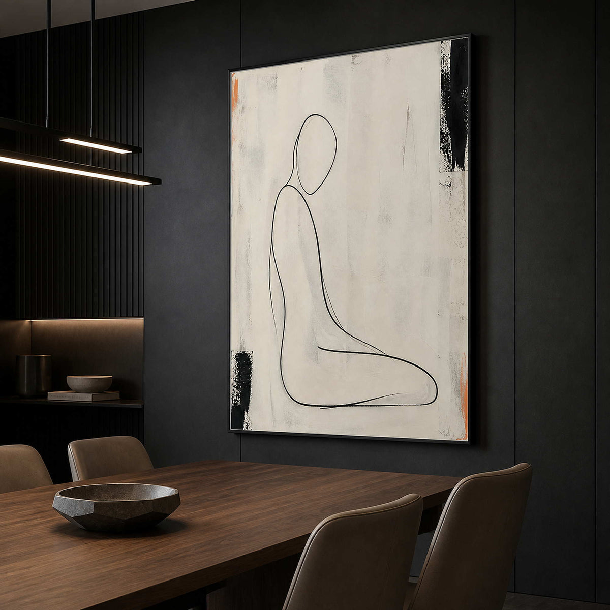 Ivory line figure painting displayed in a dark dining room.