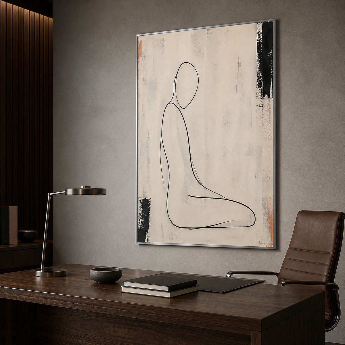 Restrained black line artwork bringing calm focus to an office.