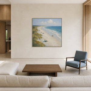Coastal beach landscape displayed in a warm ivory stone living room.