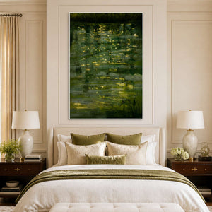 White framed green landscape above cream bedding with olive cushions and a matching throw.