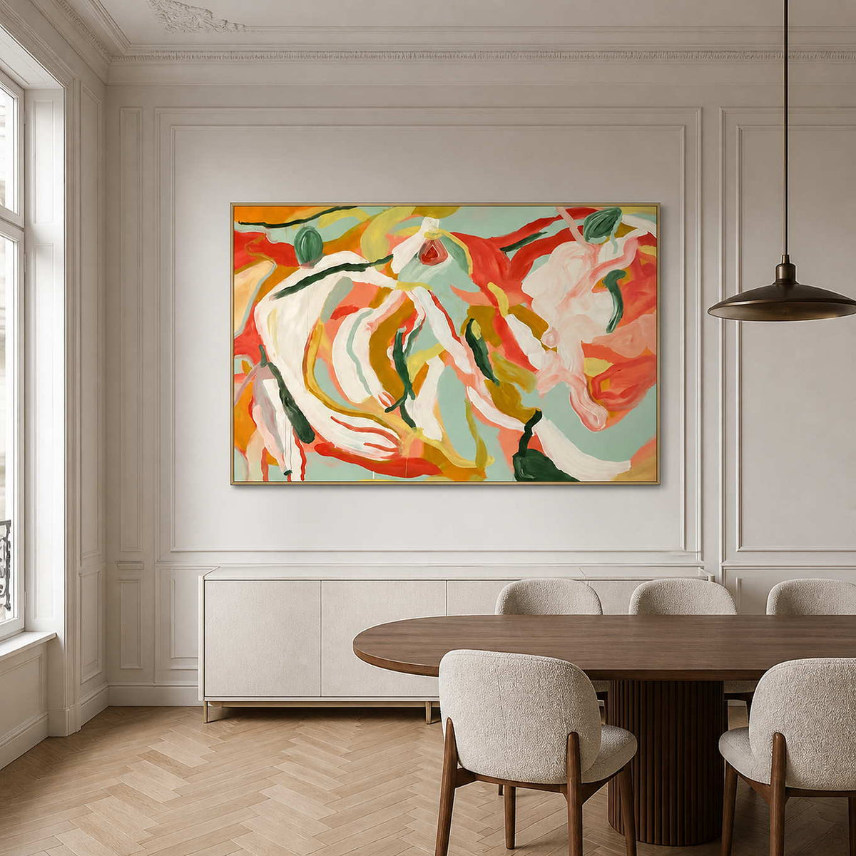 Gold-framed Summer Swirl on a white paneled wall behind a wood dining table and cream chairs.