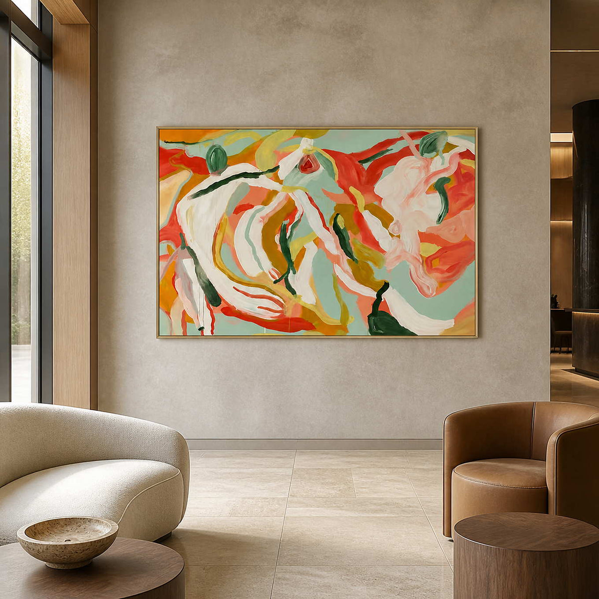 Gold-framed horizontal floral painting above lounge seating in a softly lit hotel sitting area.