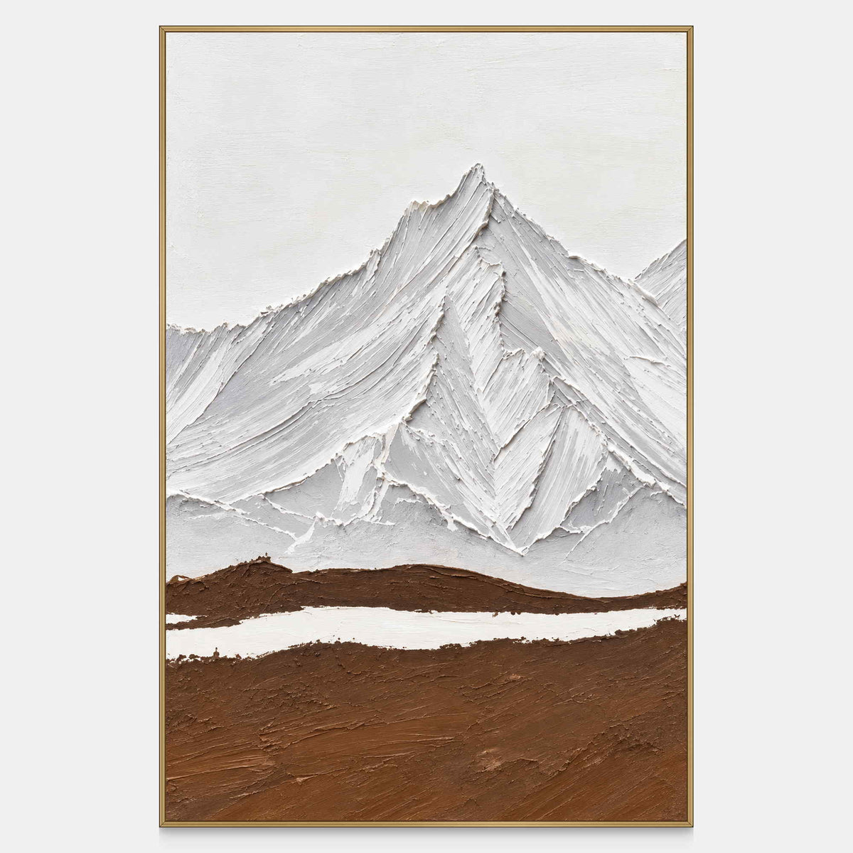 Front view of white and gray ridged mountains above a broad brown foreground and a narrow white band, with a gold-colored frame.