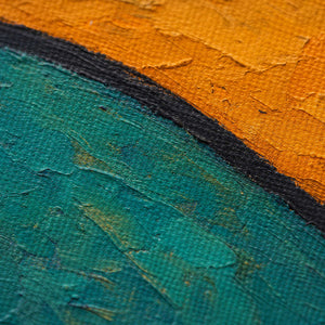 Close-up of turquoise and amber paint divided by dark graphic lines.