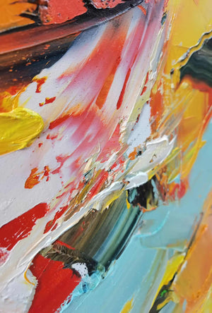 Macro view of raised white, pink, orange and blue strokes crossing dark marks.
