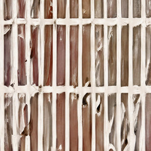 Close view of raised white intersecting lines across warm brown painted channels.
