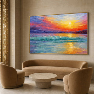 Turquoise and coral ocean wall art in a refined hotel lounge.