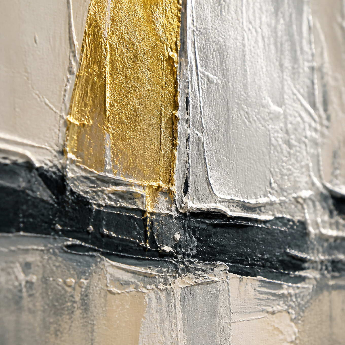 Close-up of raised gold and silver sail texture above charcoal hulls.
