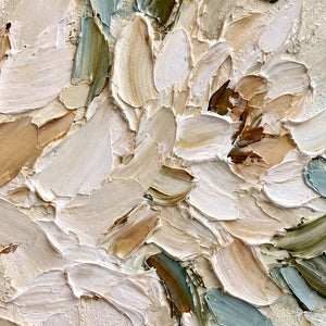 Close-up of Tenderly in Bloom showing layered cream petals with warm beige shadows and muted green leaf strokes.