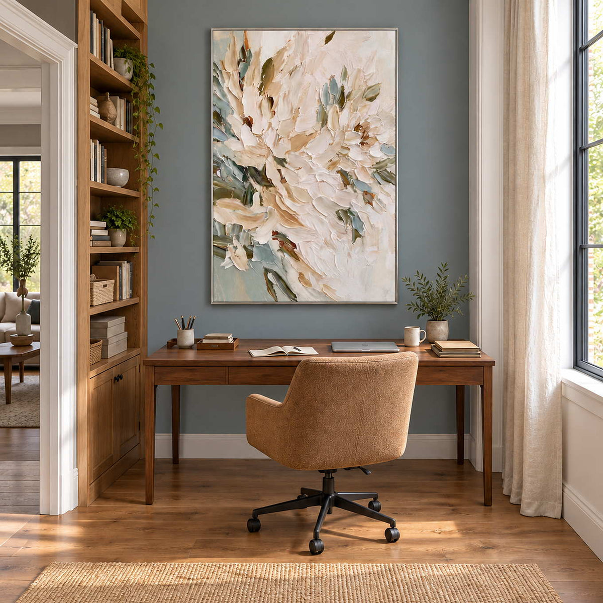 Tenderly in Bloom in a silver frame above a wood desk and tan office chair against a blue-gray wall.