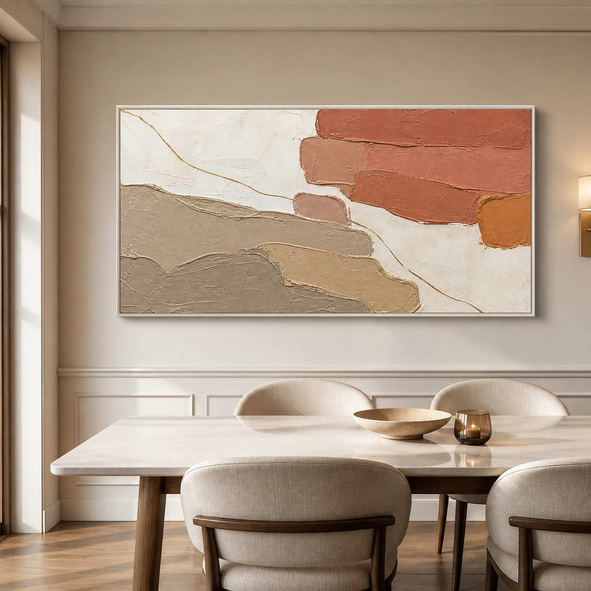 Earth tone abstract wall art displayed above an elegant dining table.