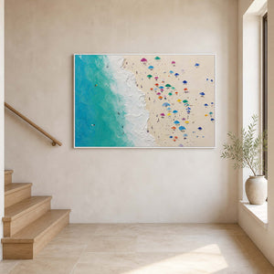 Horizontal beach wall art displayed above a warm white stair landing.