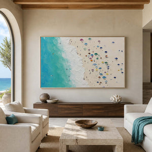 Textured coastal wall art displayed in a warm travertine living room.