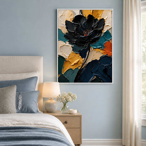 Black and teal floral wall art displayed in a mist-blue bedroom.