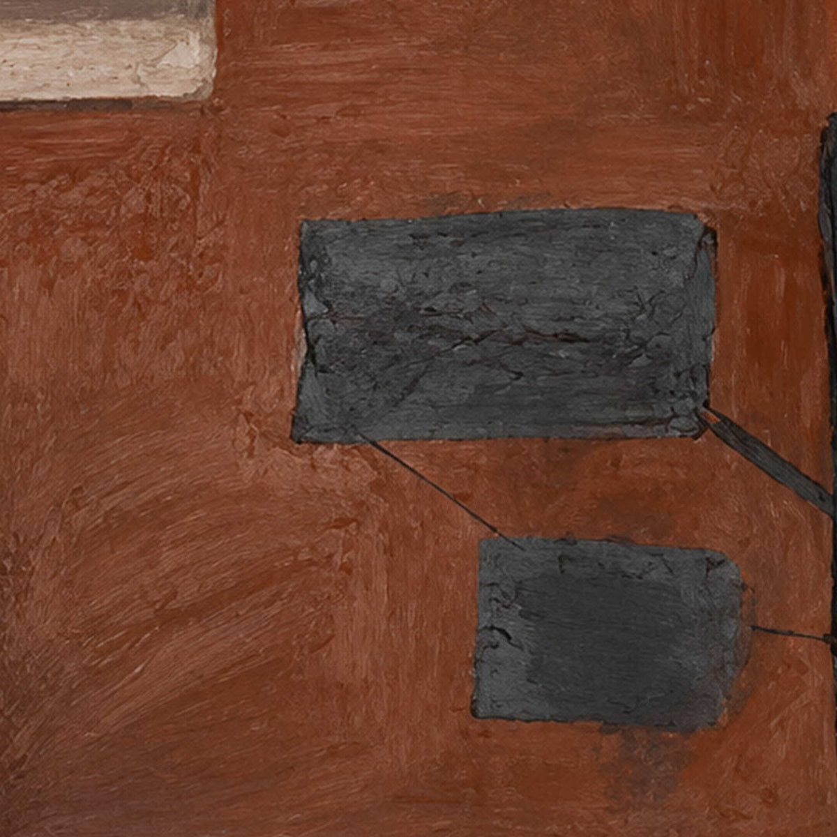 Close view of raised dark rectangles and broad rust colored brush marks.
