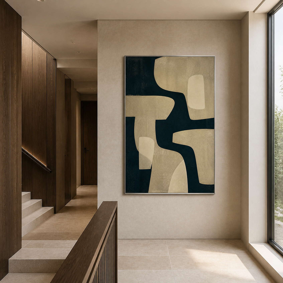 Black and beige abstract painting viewed from a duplex stair landing.