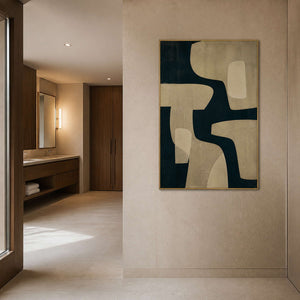 Neutral modern wall art displayed in a pale stone bathroom area.