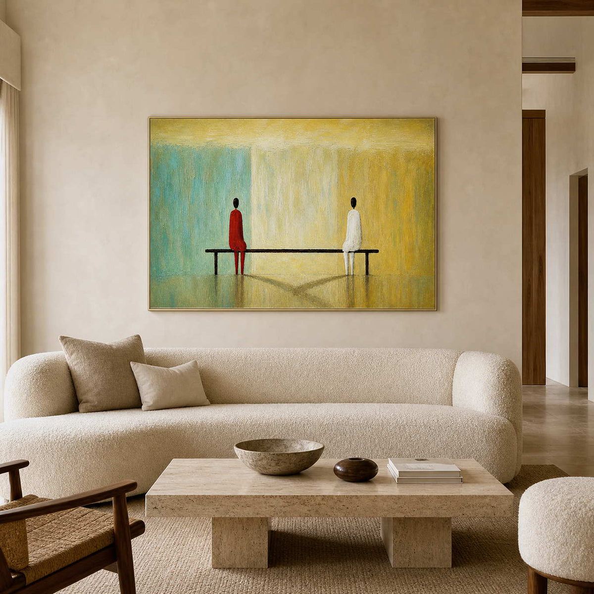 Textured figurative artwork above a warm minimalist living room sofa.