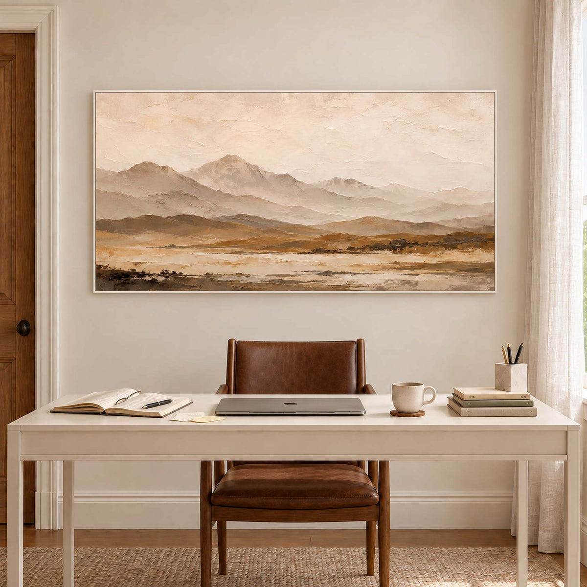 Soft taupe mountains above a muted ochre plain in a white frame, displayed in a home office.
