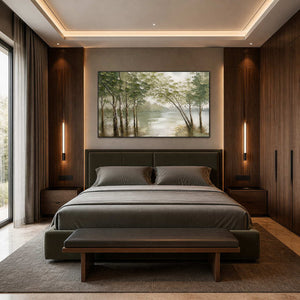 Tranquil woodland wall art displayed above a dark wood bedroom.