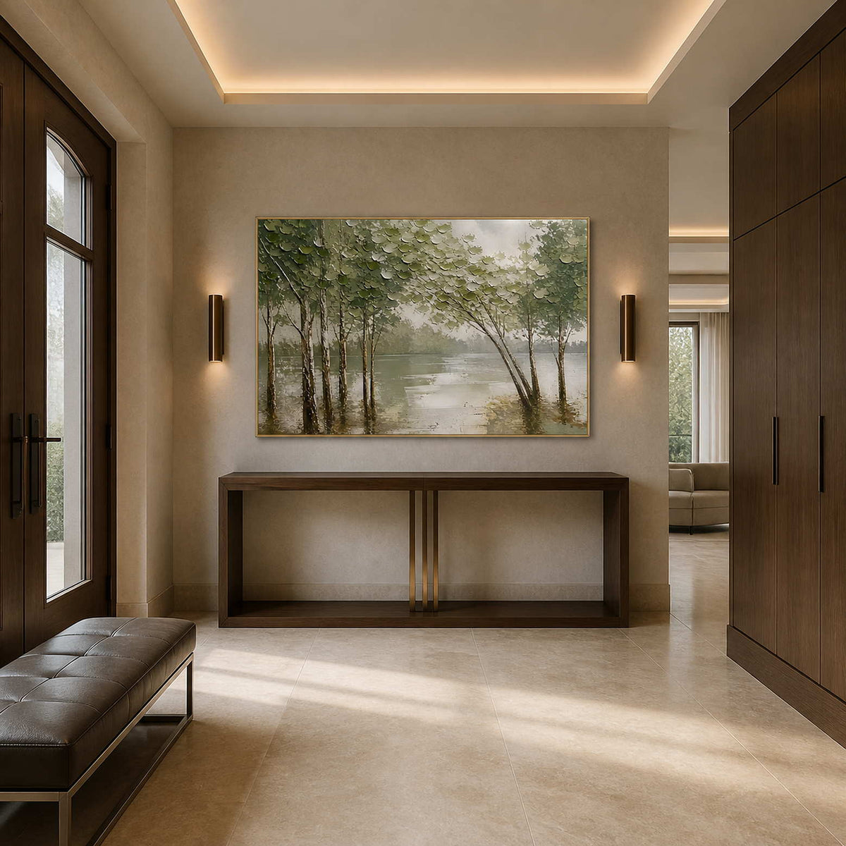 Forest wall art displayed above a minimal contemporary entryway console.