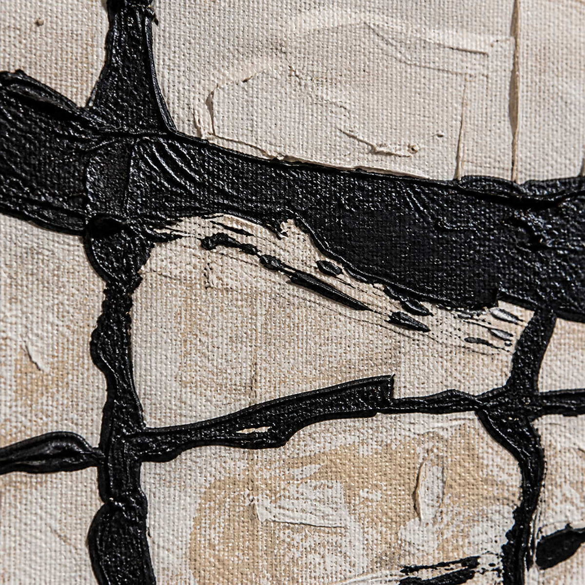 Close-up of raised black painted lines crossing cream texture and visible canvas weave.