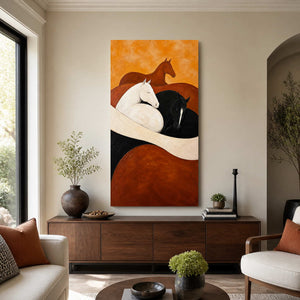 Warm horse artwork above a walnut sideboard between cream living room seating.
