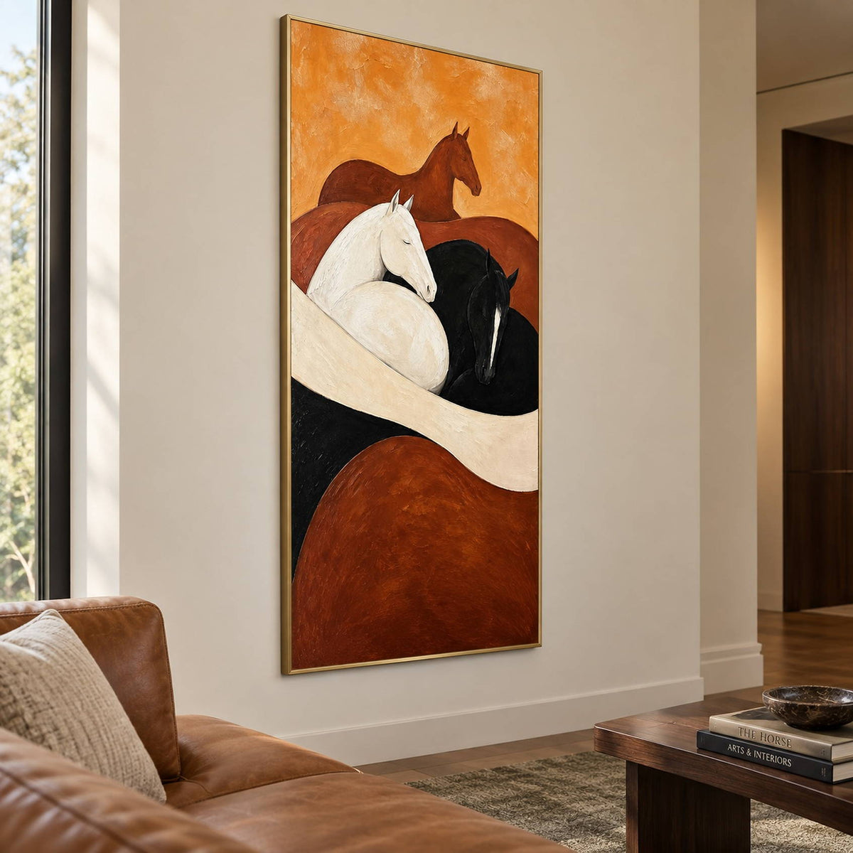 Brown, white, and black horse painting with cream and rust curves in a gold frame in a reception lounge.