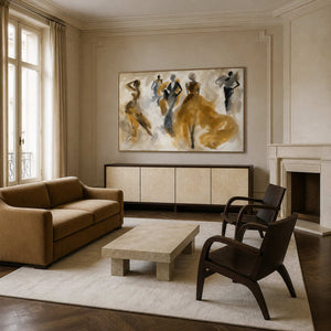 Gold and neutral figurative wall art displayed in a Paris Art Deco living room.