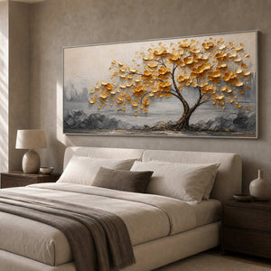 Wide golden botanical artwork in a softly lit neutral bedroom.