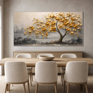Golden botanical artwork displayed above a refined neutral dining table.
