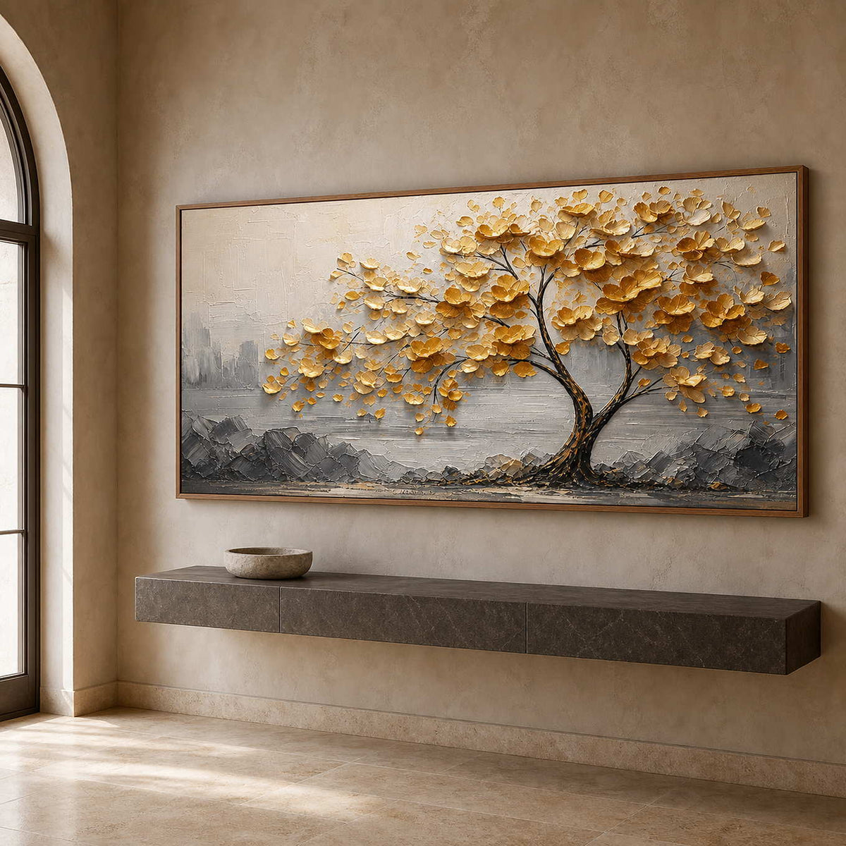 Golden tree wall art above a stone console in an entryway.