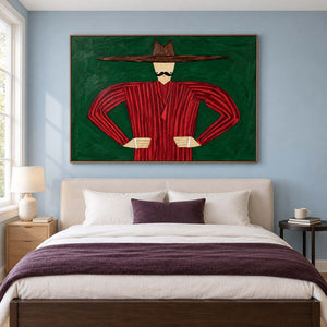 Red and green portrait above a cream bed with a plum-colored throw.