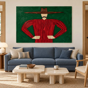 Red-striped portrait above a blue sofa with two pale rounded coffee tables.