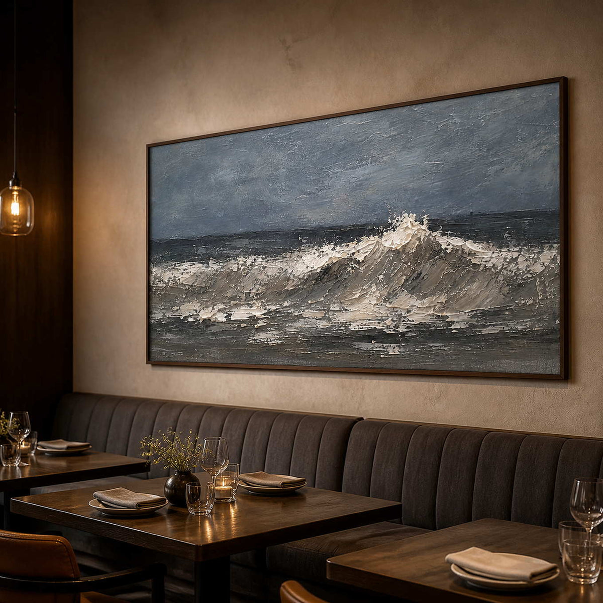 Panoramic charcoal ocean art displayed in an elegant dining room.