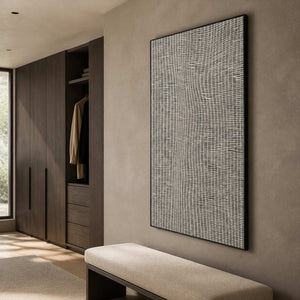 Gray lattice artwork displayed in a warm brown dressing room.
