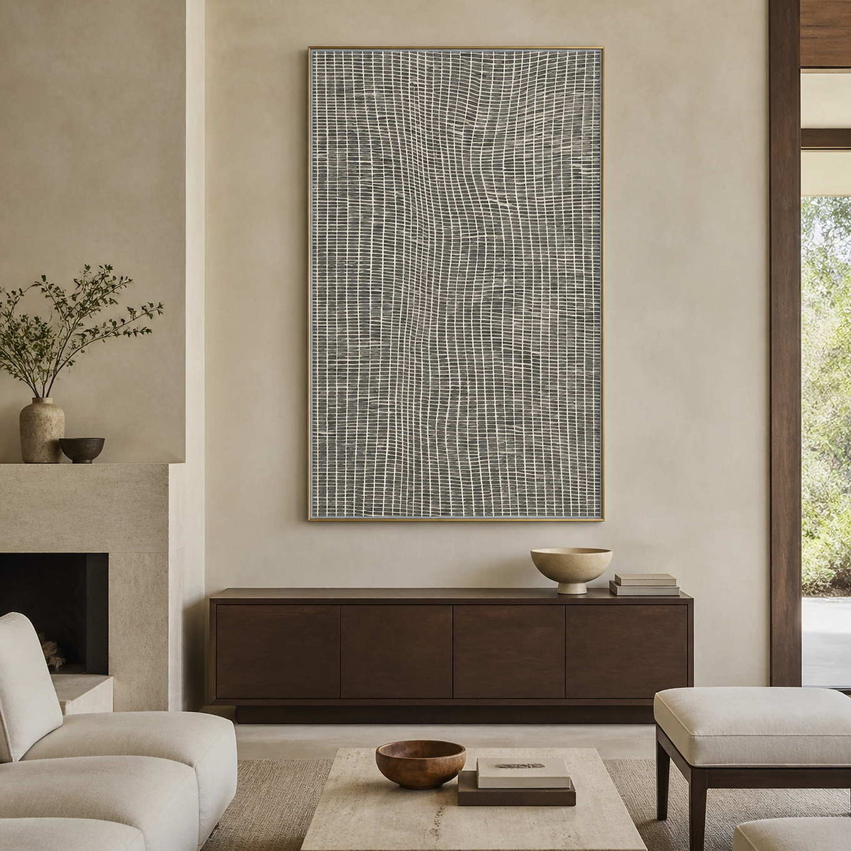 Textured minimalist wall art displayed in a warm gray living room.