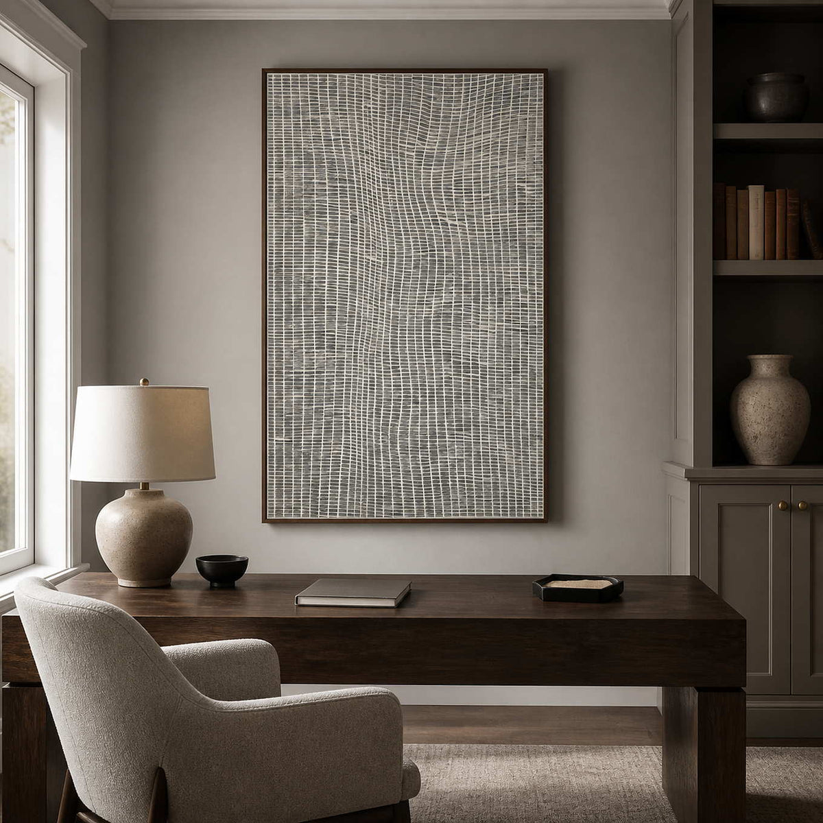 Monochrome textured wall art displayed in a fog-gray walnut office.