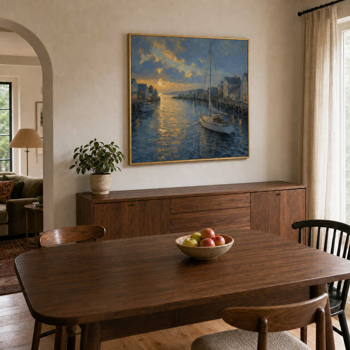 Blue and gold harbor wall art displayed in a warm wood dining room.