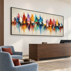 Panoramic harbor painting with colorful sail-like shapes and reflections in a black frame in a reception lounge.