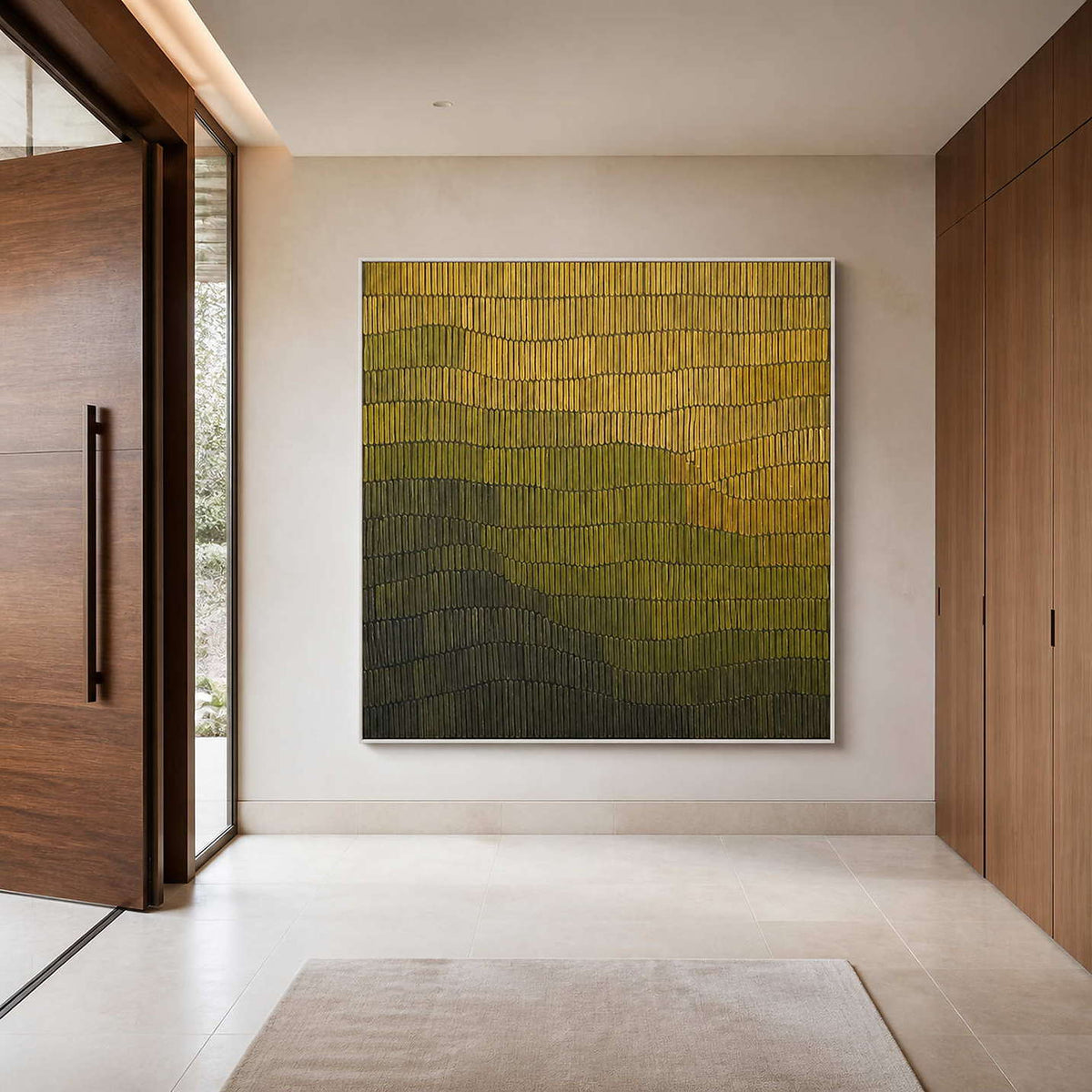 Square olive and ochre wall art in a minimalist entryway.