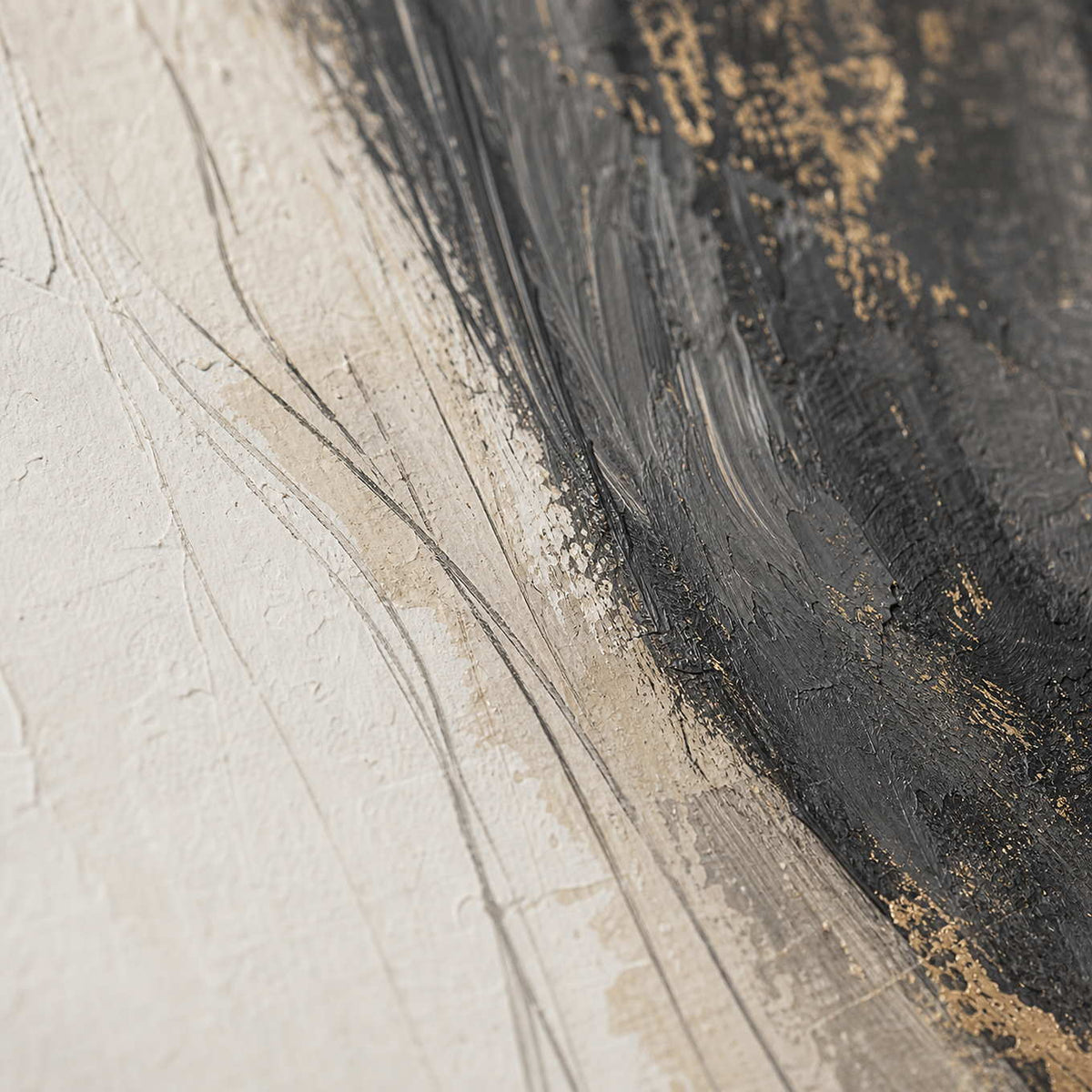 Close-up of raised hand-painted texture in black, white, and earth tones.
