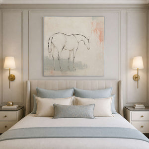 Ivory and blush horse artwork styled above a serene bedroom.