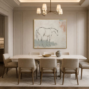 Quiet equestrian artwork displayed in a refined cream dining room.