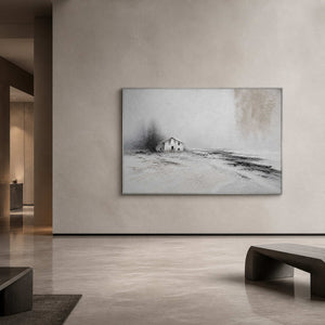 Large quiet winter landscape wall art in a hotel lobby with a silver frame.