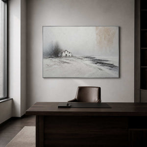 Minimalist winter landscape wall art in a sophisticated office with a silver frame.