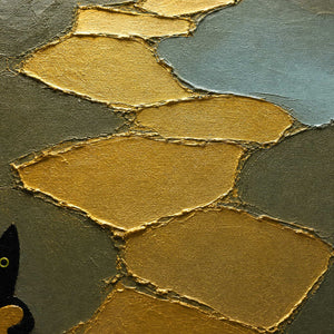 Close-up of raised gold palette-knife edges beside the black cat figure.